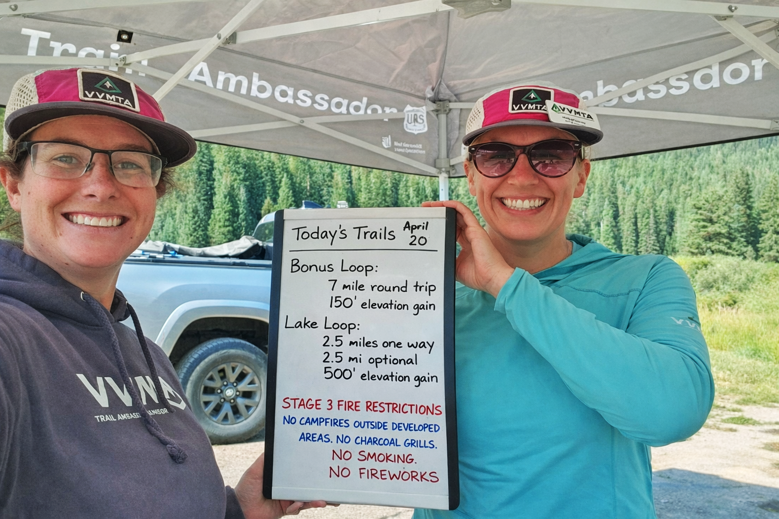 VVMTA Trail Ambassadors displaying fire restriction guidelines at an Eagle County Wilderness trailhead