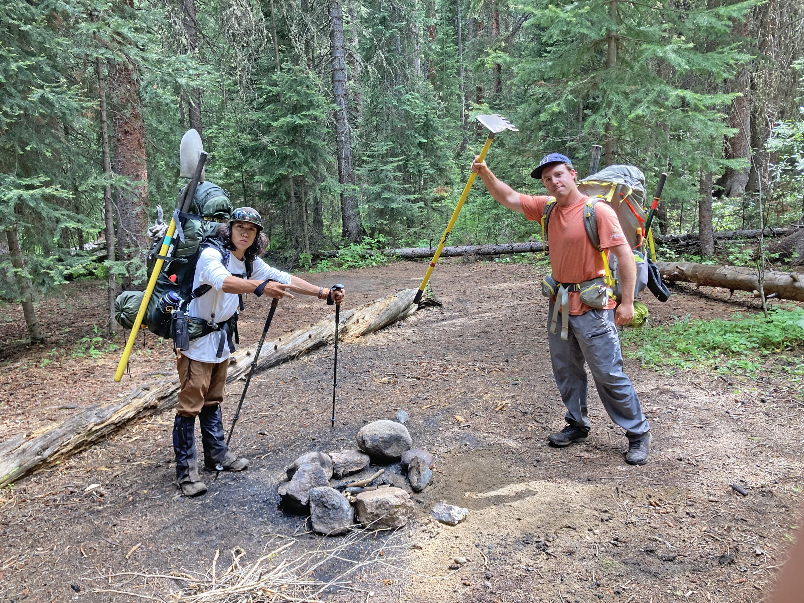 Two Trails and Stewardship Crew members with hand tools on Cross Creek trail