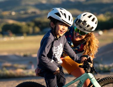 adult and child biking together outdoors through Soul Dirt program in Eagle County